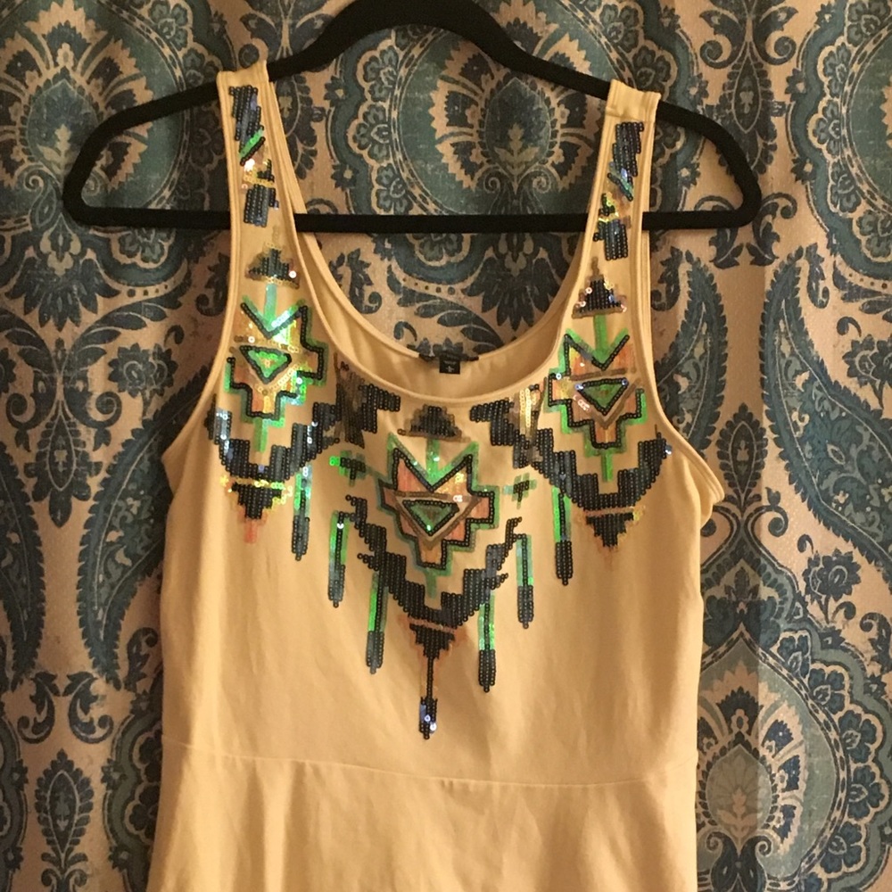 Cream tribal print peplum top
